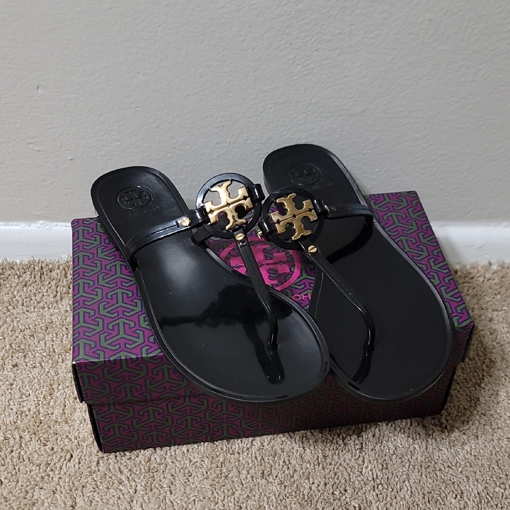 Tory Burch Black and Gold Sandals with Medallion